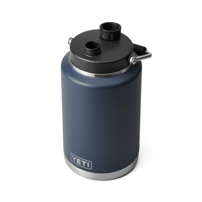 Three quarter overhead view of the navy YETI Rambler one gallon jug and cap