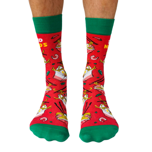 Pair of red men's crew socks with green accents, featuring a noodle bowl design and the phrase 'Send Noods,' decorated with chopsticks and noodle imagery.