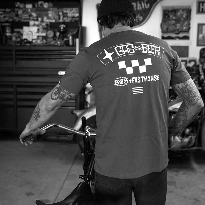 Fasthouse 805 Bar midweight graphic t-shirt in heavy metal, shown worn in a shop setting