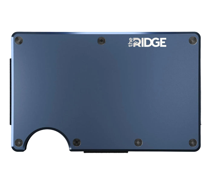 Ridge Alpine Navy aluminum minimalist wallet, front view with cards fanned from the injector