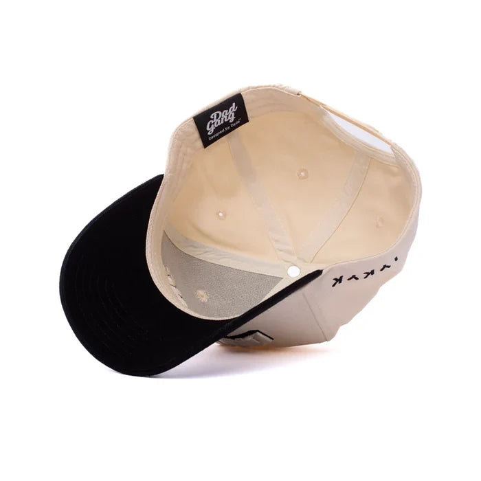 Arch Logo snapback hat by Dad Gang in cream and black, additional view of the front logo