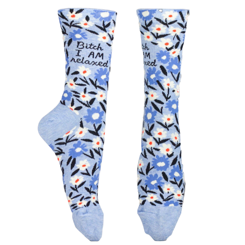 Bitch I Am Relaxed - Sock Bar. Blue background with flower pattern. Writing on socks says "Bitch I AM relaxed" Order with free shipping through The Sock Bar