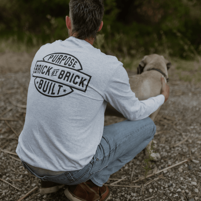 Purpose-Built Brick By Brick long sleeve tee in ash, back view of the print
