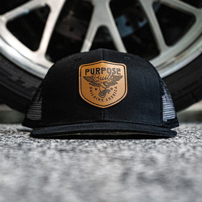 Purpose-Built Building America flat brim mesh back cap in black, main product view