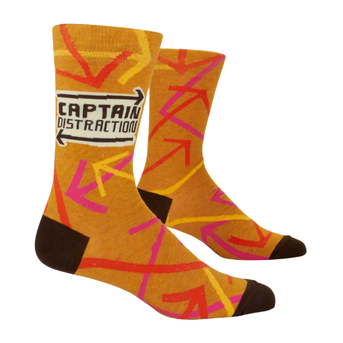 A colorful pair of Blue Q socks featuring the phrase 'Captain Distraction' with fun superhero-style graphics, perfect for easily distracted but lovable personalities.