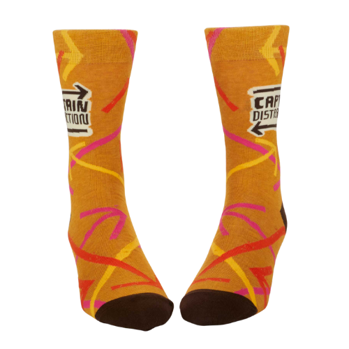 A colorful pair of Blue Q socks featuring the phrase 'Captain Distraction' with fun superhero-style graphics, perfect for easily distracted but lovable personalities.
