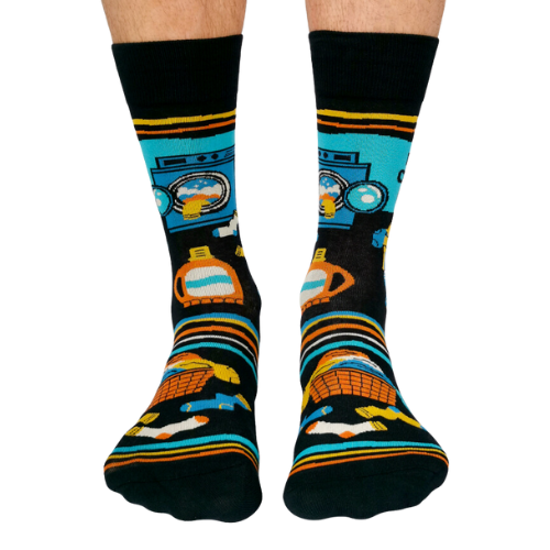 A pair of men’s socks in a clean, minimalist design. The socks are solid white with subtle ribbed detailing along the cuff for a snug fit. Made from soft, breathable cotton, these mid-calf socks offer a crisp, fresh look, ideal for everyday wear or pairing with formal shoes. The simplicity of the design emphasizes cleanliness and comfort, perfect for men who prefer a classic, no-frills style.