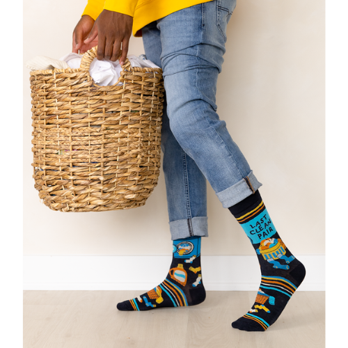 A pair of men’s socks in a clean, minimalist design. The socks are solid white with subtle ribbed detailing along the cuff for a snug fit. Made from soft, breathable cotton, these mid-calf socks offer a crisp, fresh look, ideal for everyday wear or pairing with formal shoes. The simplicity of the design emphasizes cleanliness and comfort, perfect for men who prefer a classic, no-frills style.