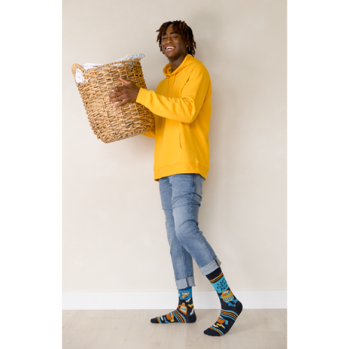 A pair of men’s socks in a clean, minimalist design. The socks are solid white with subtle ribbed detailing along the cuff for a snug fit. Made from soft, breathable cotton, these mid-calf socks offer a crisp, fresh look, ideal for everyday wear or pairing with formal shoes. The simplicity of the design emphasizes cleanliness and comfort, perfect for men who prefer a classic, no-frills style.