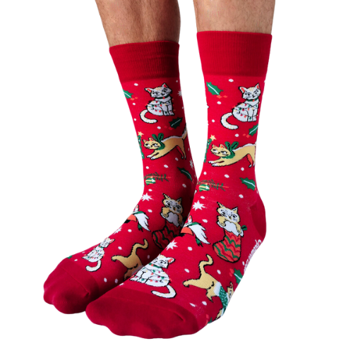 Red festive socks featuring playful holiday-themed cats, gifts, and holly designs.