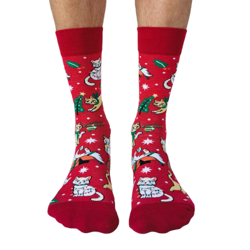 Red festive socks featuring playful holiday-themed cats, gifts, and holly designs