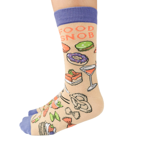 Food Snob Women's Crew Socks. Pilates? Thought you said pie and lattes! ──────────────── Size Women's shoe size 6-9 Men’s shoe size 4-7 EUR 37-41 ──────────────── Materials & Attributes 70% Combed Cotton, 28% Nylon and 2% Spandex. Reinforced stitching on toe to protect from wear. Print on Socks: "Food Snob" ──────────────── Care Machine wash and hang to dry. Do not iron or bleach.