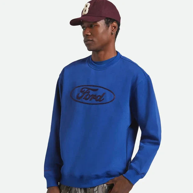 Brixton Ford Number One fleece crewneck sweatshirt in Ford blue, shown on a model