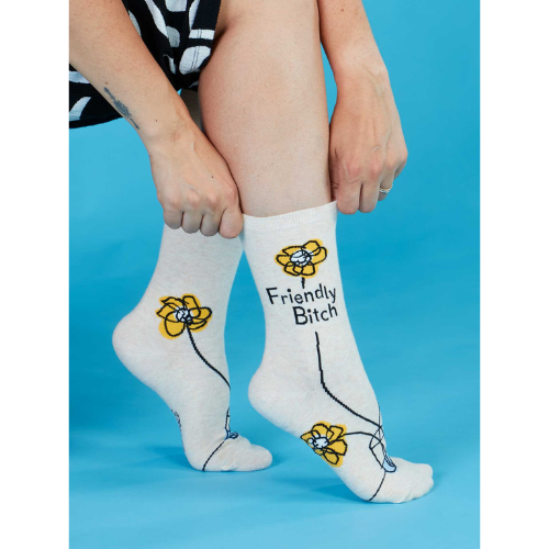 Women’s crew socks featuring the phrase ‘Friendly Bitch’ in a fun, sassy design.