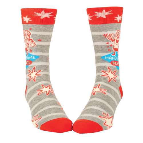 Blue Q socks featuring the phrase "Handsome Devil," with a playful design ideal for those who like to add a bit of charm and mischief to their look.