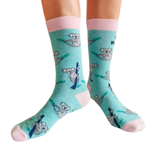 Highly Koalafied, teal background and pink toes and heal. Koala pattern all over the socks with print on socks "Highly Koalafied"