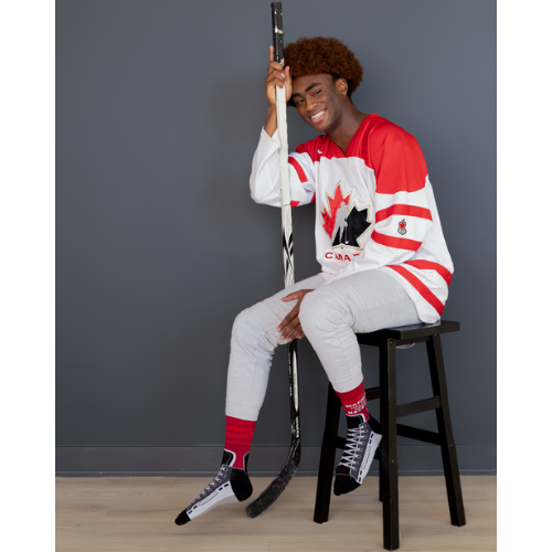 Custom 'Hockey Talk' socks with playful hockey phrases and designs, perfect for fans of the game.