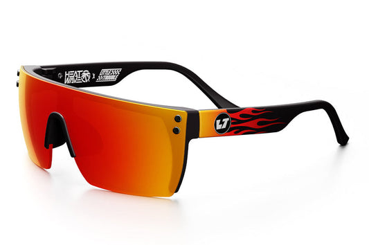 Kids Lazer Little Trouble sunglasses by Heat Wave Visual in flames print, angled view