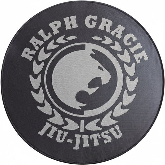 Round black mat with 'Ralph Gracie Jiu-Jitsu' logo in white on a white background