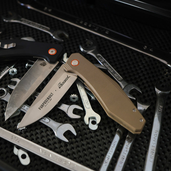 Crimson M6 folding pocket knife, Thorogood x Purpose-Built edition, detail view of the handle