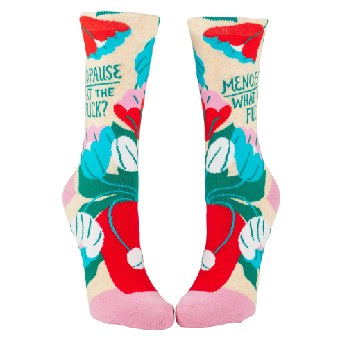 Blue Q W-Crew socks with the phrase "Menopause. What The Fuck?"—a humorous design to lighten the journey through menopause.