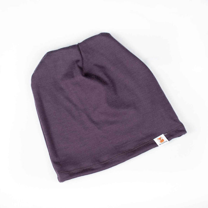 Flat Lay show of the Iris colour merino wool slouchie hat made by TK Clothing
