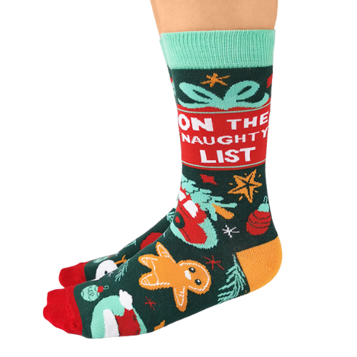 Uptown Sox's 'On the Naughty List' socks featuring fun, cheeky holiday designs, perfect for adding a playful touch to your festive outfits.