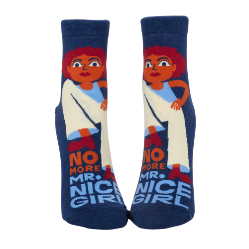 A pair of fierce Blue Q socks featuring the phrase 'No More Mr. Nice Girl' in bold lettering with stylish, empowering graphics.