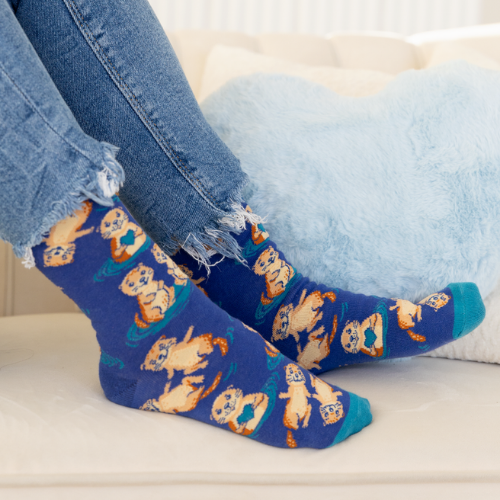 Otterly Adorable Socks by Uptown Sox featuring cute otter designs, perfect for animal lovers looking for cozy and fun socks with a playful twist.