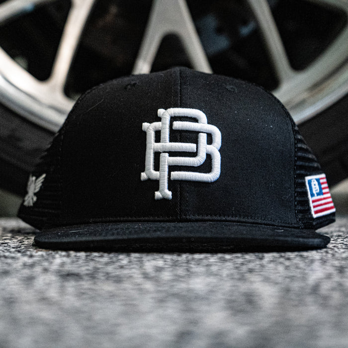 Purpose-Built PB Crest flat brim mesh back cap in black, main product view