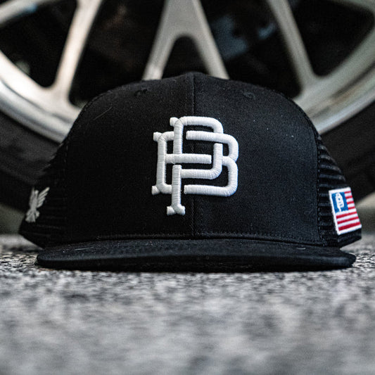 Purpose-Built PB Crest flat brim mesh back cap in black, main product view