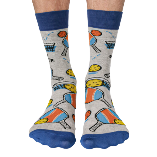 Gray Day Dinker socks featuring colorful pickleball paddles, balls, and nets with a blue cuff and toe design