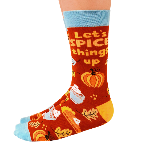 Print on Socks: "Let's Spice Things Up" Orange background with all things fall on them.