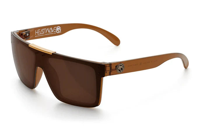Quatro Z87 safety sunglasses by Heat Wave Visual in saddle with polarized lenses, angled view
