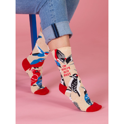 Blue Q crew socks with colorful birds and the phrase 'I'm Really Into Birds' printed on them.