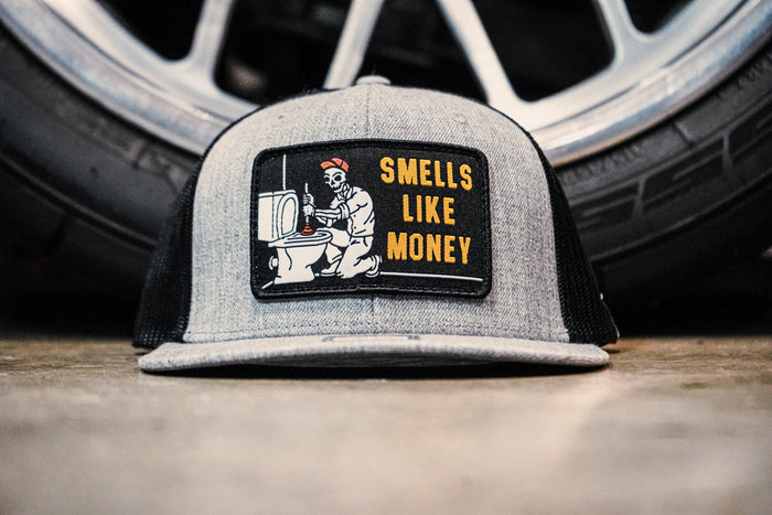 Trade Money Smells Like Money meshback hat shown worn