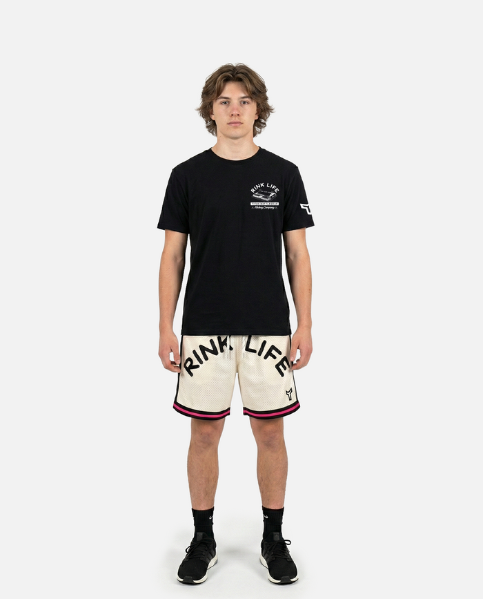 male model wearing titan battlegear beige shorts with 'RINK LIFE' text on a white background