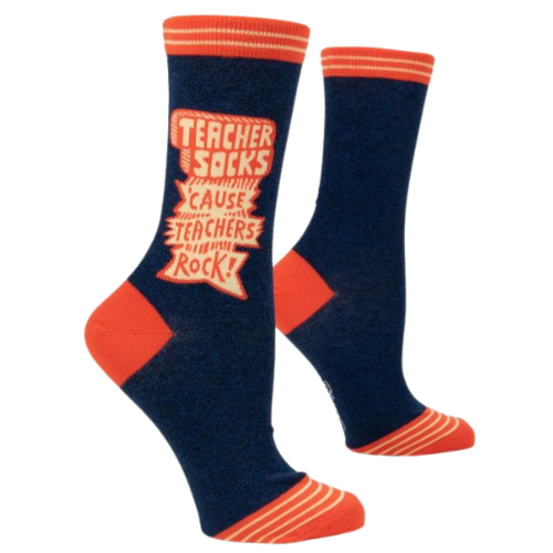 TEACHER SOCKS 'CAUSE TEACHERS ROCK CREW SOCKS NEW 2023 THE SOCK BAR. Dark blue background with orange on toes. heal and top.
