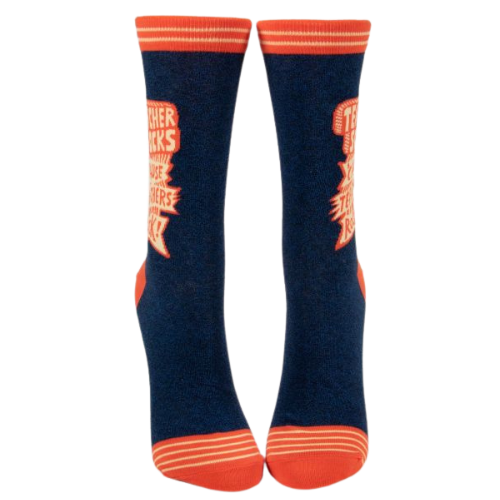 TEACHER SOCKS 'CAUSE TEACHERS ROCK CREW SOCKS NEW 2023 THE SOCK BAR. Dark blue background with orange on toes. heal and top.