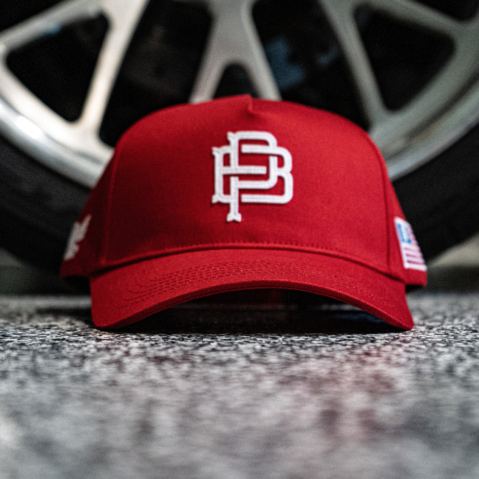 Purpose-Built The Crest curved brim cap in red, main product view