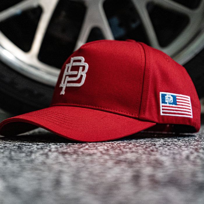 Purpose-Built The Crest curved brim cap in red with American flag patch, alternate product view