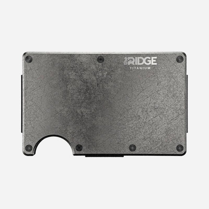 Ridge stonewashed titanium money clip wallet, front view with cards fanned out
