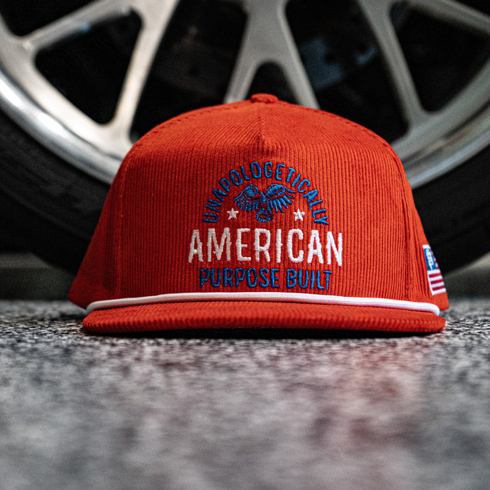 Unapologetically American corduroy flat brim snapback hat in red, main product view