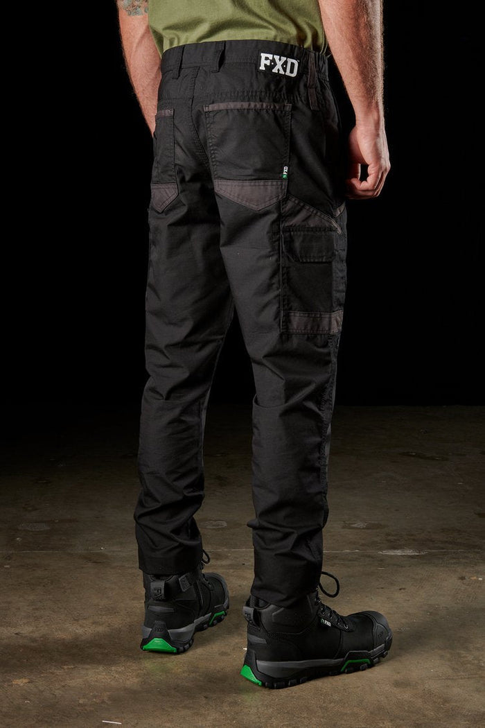 Back three quarter view of the FXD WP5 black stretch cargo work pant